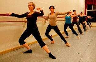 Adult Ballet Dance Students executing a soutenu side in an American Dance Institute Greenwood a studio class. Adult Ballet Dance Students executing a soutenu side in an American Dance Institute Greenwood a studio class.